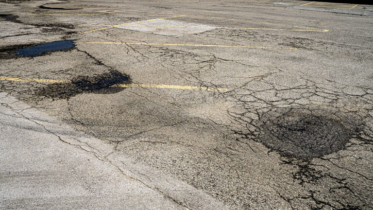 Signs it's time to repave your parking lot
