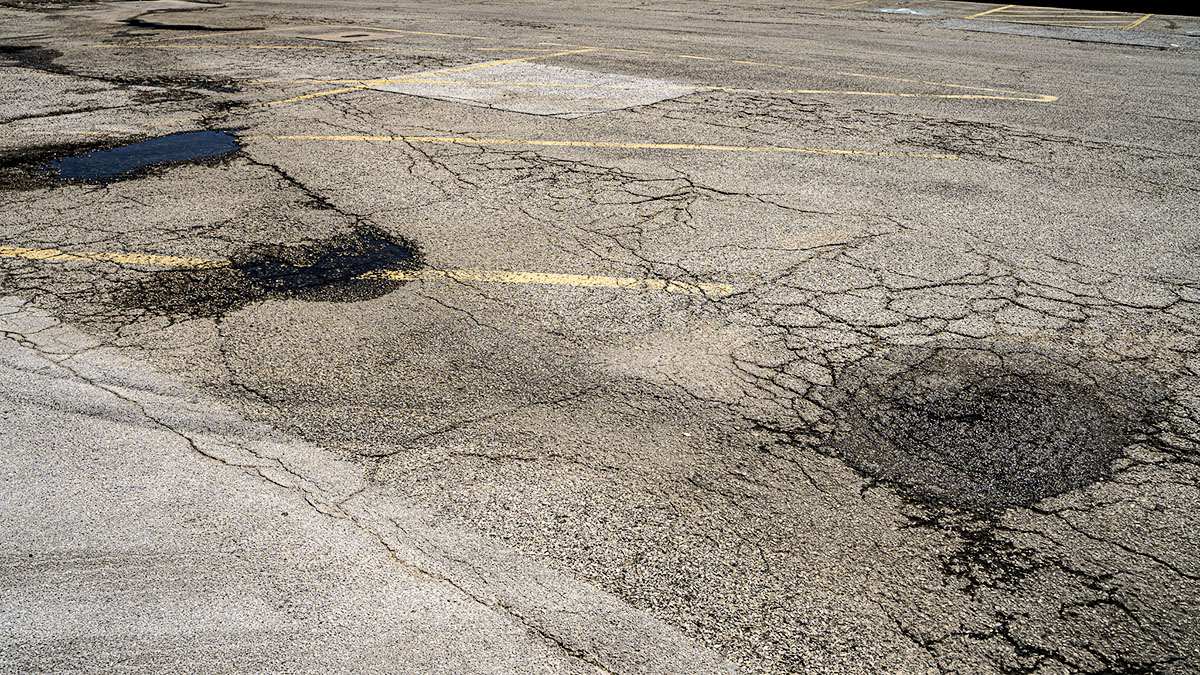 Read more about the article Signs That It’s Time to Repave Your Parking Lot!