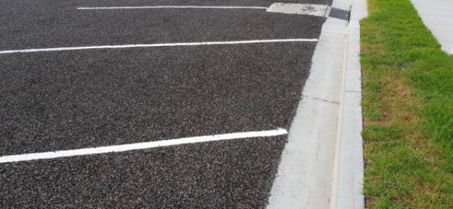 Newly marked angled parking spots on a road and footpath